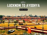 The image is an advertisement for a book titled "Lucknow to Ayodhya". The background of the image is a beautiful view of the...