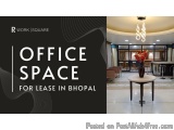The image is a promotional graphic for an office space for lease in Bhopal. The background of the image is black with white t...