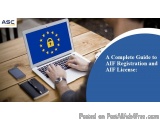 The image shows a person working on a laptop with the European Union flag on the screen. The laptop is placed on a wooden tab...