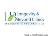 The image is a logo for a company called "Longevity & Beyond Clinics". The logo is written in a modern, sans-serif font and i...
