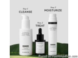 The image shows three skincare products from the brand Kimirica. The products are arranged in a row on a green leaf backgroun...