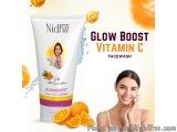 The image is an advertisement for a face wash product called Nidhi Glow Boost Vitamin C Facewash. The product is a tube with...