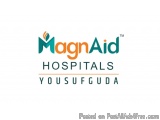 The image is a logo for a company called MagnAid Hospitals. The logo is written in a modern, sans-serif font and is in a comb...