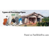 The image shows a house with a variety of plumbing pipes and pipes in front of it. The house is a two-story building with a s...
