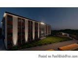 The image is a 3D rendering of a modern apartment building at night. The building is a two-story structure with a flat roof a...