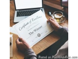 The image shows a person's hands holding a certificate of excellence. The certificate is white with black text and has the wo...