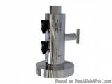 The image shows a cylindrical-shaped machine with a silver-colored body and a black handle on the right side. The machine app...