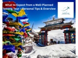 The image shows a beautiful archway in the middle of a snowy mountain landscape. The archway is made of red and blue stone an...