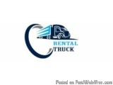 The image is a logo for a rental truck company. It has a blue circle with a white truck in the center. The truck is a semi-tr...