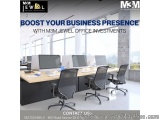 The image shows an office space with multiple computer desks and chairs. The desks are arranged in a neat and organized manne...