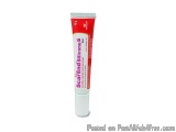The image is of a tube of Scandicone gel. The tube is white with a red cap and has the brand name "Scandicones" written in bo...