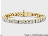 The image is of a gold bracelet with a rectangular clasp. The bracelet is made up of small, round diamonds arranged in a repe...