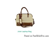 The image is of a laptop bag. It is made of a beige-colored fabric with a brown leather trim. The bag has a rectangular shape...