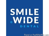 The image is a logo for Smile Wide Dental. It is a blue square with white text that reads "Smile Wide" in a bold, sans-serif...