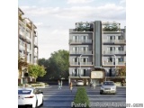 The image is a 3D rendering of a modern apartment building. The building is a two-story structure with multiple floors and ba...