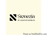 The image is a logo for Stonezia by Udaipur Marbles. It is a simple and minimalistic design with a white background. The logo...