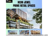 The image is a collage of three photographs of a modern retail space called M3M Jewel Prime Retail Spaces. The first photogra...