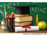 The image shows a stack of books with a black graduation cap on top. The books are arranged in a neat stack and are tied toge...