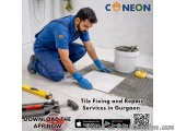 The image shows a man in a blue uniform kneeling on the floor and working on a tile floor. He is wearing blue gloves and appe...