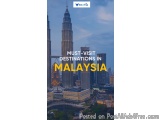 The image is a photograph of the Petronas Twin Towers in Kuala Lumpur, Malaysia. The tallest building in the image is the ico...