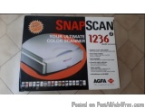 The image is of a product packaging of the brand AGFA. The packaging is a black cardboard box with an orange and white design...