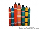 The image shows a group of six cylindrical objects, which appear to be markers or markers. The objects are arranged in a row,...