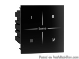The image is a black square-shaped device with the word "Scene" written in white capital letters in the center. The device ap...