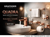 The image is an advertisement for Grafdoer Quadra Rose Gold Accessories. It features a modern bathroom with a white sink and...