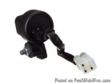 The image shows a black-colored electrical component, which appears to be a switch or a component of a vehicle's ignition sys...