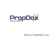 The image is a logo for a company called PropDox. The logo is written in a modern, sans-serif font and is in a dark blue colo...