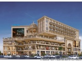 The image is a 3D rendering of a modern, luxurious building with a cinema-like appearance. The building is located on a stree...