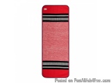 The image is of a rectangular rectangular object with a red background. The object appears to be made of a soft, plush materi...