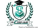 The image is a logo for a company called "SUESS HUB". The logo is a shield-shaped emblem with a green background and a white...