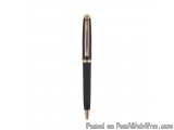 The image is of a black ballpoint pen with a gold-colored cap. The pen has a sleek and modern design with a curved body and a...