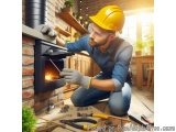 In this image, we can see a man wearing a yellow hard hat, safety glasses, and overalls, kneeling on the floor in front of a...