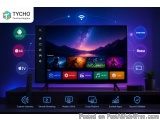 The image shows a flat screen TV mounted on a black stand with a remote control in front of it. The TV is displaying various...