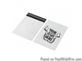 The image shows two white envelopes with a black stripe on the top. The envelopes are open, revealing the contents inside. On...