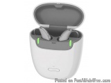 The image shows a white earbud case with a grey lid. The case is open, revealing the earphones inside. The earphones are silv...
