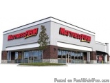 The image is a 3D rendering of a mattress firm store. The store is a two-story building with a white exterior and a red and y...