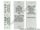 The image shows three rectangular labels with the text "Made in India" written on them. The labels are made of 100% pure silk...