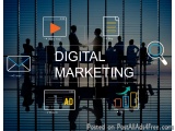 The image is a digital marketing concept. It shows a group of people sitting around a table in a conference room, with a larg...