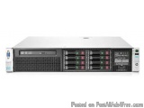 The image shows a desktop computer server. It is a rack-mounted server with a silver exterior and a black interior. The front...
