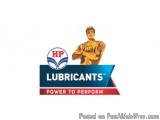 The image is a logo for HP Lubricants. It features a man in a yellow suit with his arms crossed, standing in front of a blue...