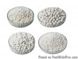 The image shows four small glass bowls filled with small, round, white balls. The bowls are arranged in a triangular formatio...