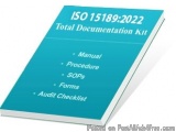 The image is a photograph of a book titled "ISO 15189:2022 Total Documentation Kit". The cover of the book is blue and has wh...