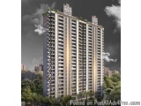 The image is a 3D rendering of a tall, modern apartment building. The building is located in a residential area with other bu...