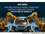The image shows two yellow robotic arms working on a car in a factory. The arms are holding a welding torch and are working o...