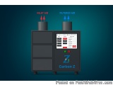 The image shows a black-colored machine with a screen on the front. The screen displays the text "Inlet Air" and "Filtered Ai...