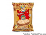 The image is of a packet of Deepak Chakki Fresh Atta. The packet is rectangular in shape and has a red and yellow color schem...