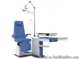 The image shows a medical examination table with a blue and white color scheme. The table has a rectangular base with a white...